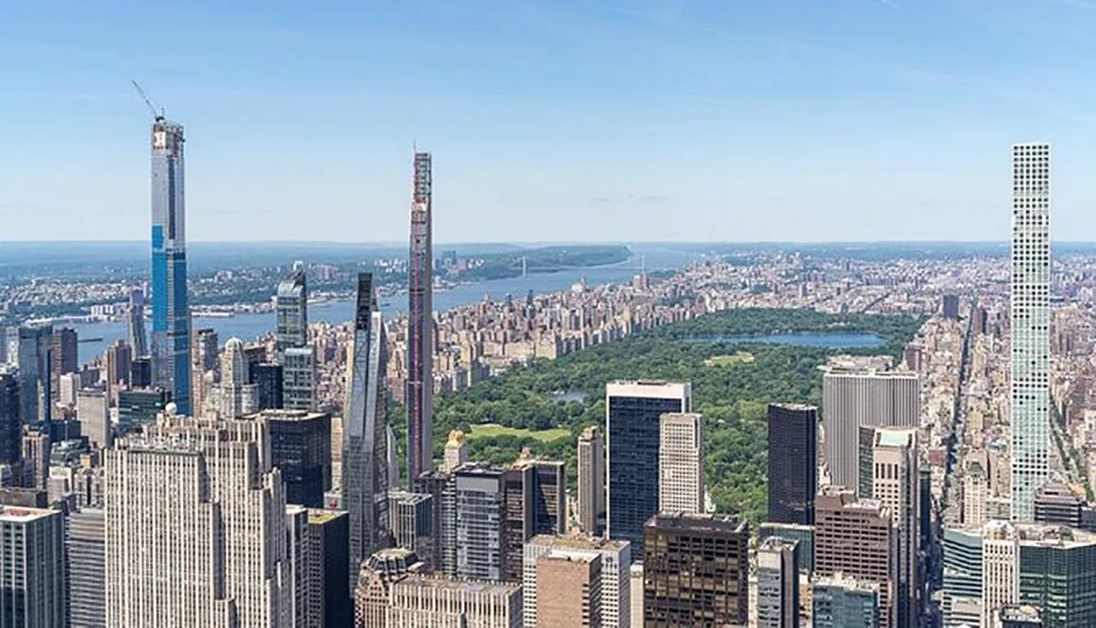 The image features an aerial view of the New York City skyline with Central Park in the foreground and skyscrapers under construction in the background