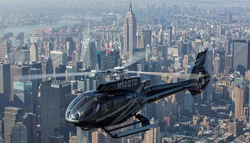 A helicopter is flying over a bustling cityscape with skyscrapers in the background