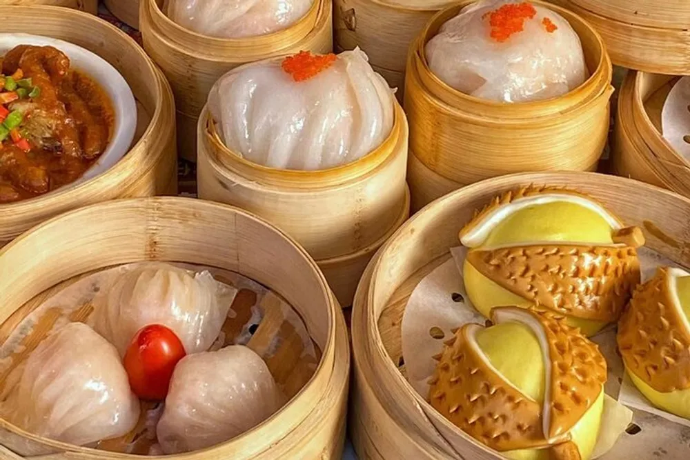 The image shows an array of bamboo steamers containing various dim sum items including dumplings and ornately shaped food suggesting a Chinese culinary setting