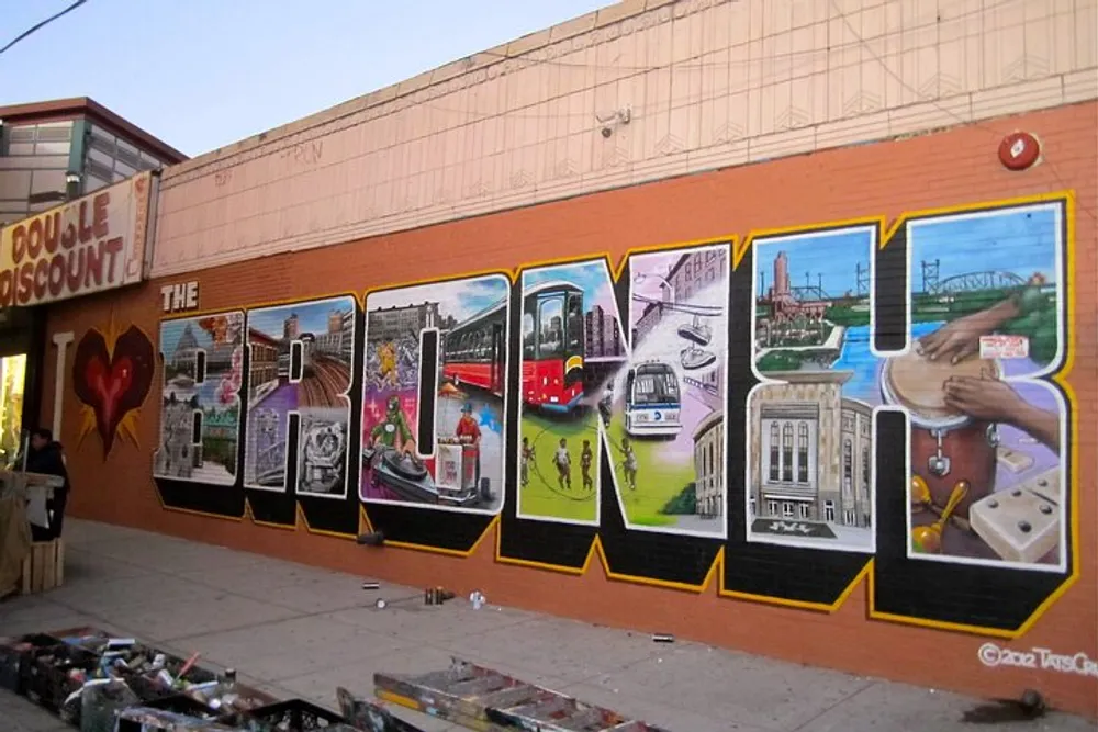 The image shows a vibrant street mural with various panels depicting different urban scenes and cultural icons framed with a bold comic book-like outline