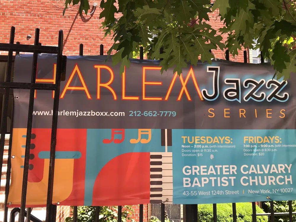The image shows a banner promoting the Harlem Jazz Series held at the Greater Calvary Baptist Church detailing the event times admission prices and featuring a stylized trumpet and musical notes against a colorful background